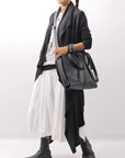 【NOSTRASANTISSIMA】 ASYMMETRY BACK CROSS CARDIGAN TS24_BLACK