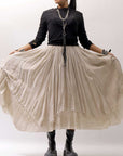 【sanctamuerte】 LAYERED ASYMMETRY SKIRT SM33_SAND SHELL