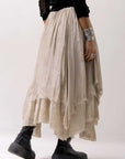 【sanctamuerte】 LAYERED ASYMMETRY SKIRT SM33_SAND SHELL